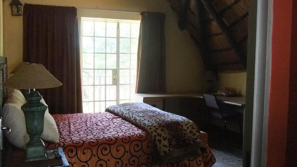Treetops & Treats Guest House Pretoria-Noord Szoba fotó